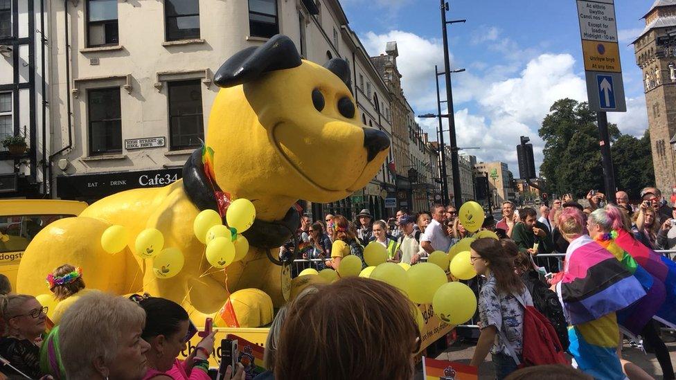 A large smiling ornamental dog