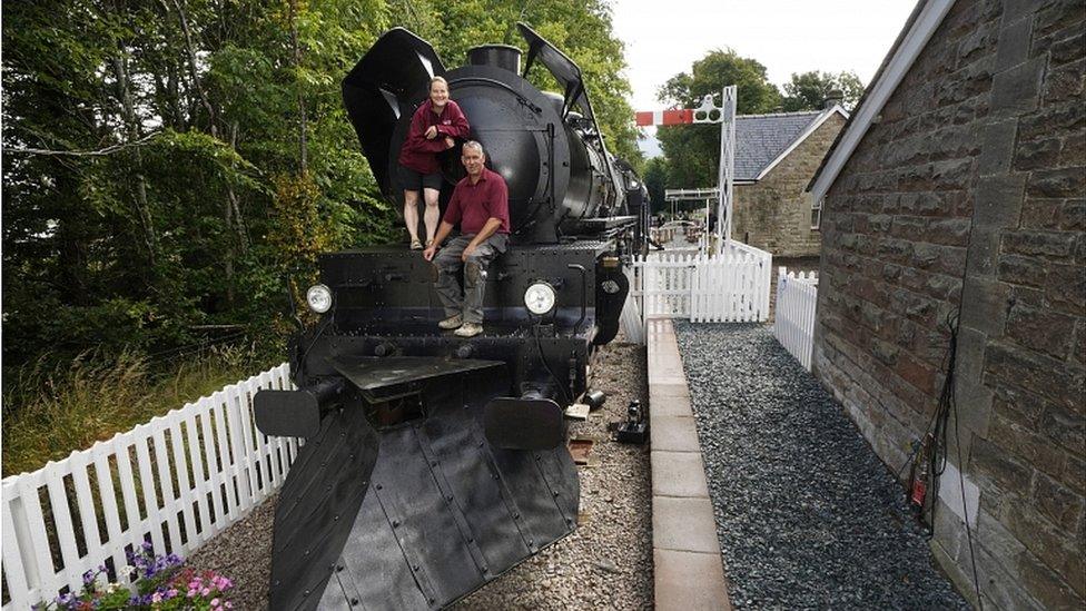 Di and Simon Parums aboard their replica steam