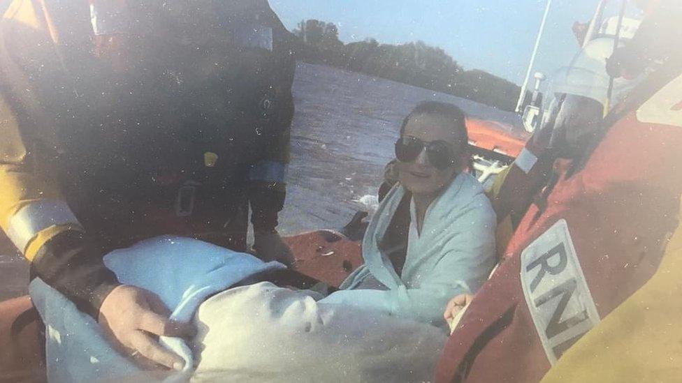 Woman rescued from listing boat in Norfolk