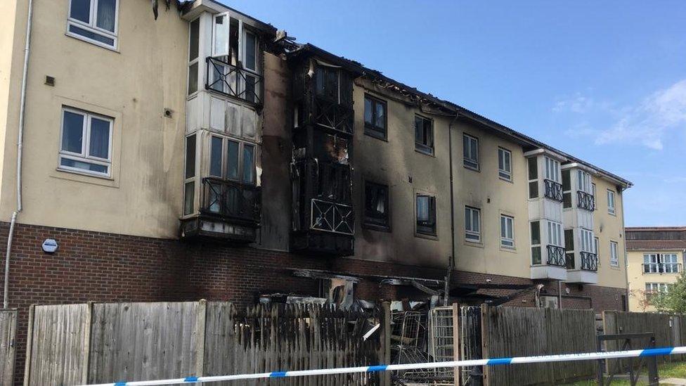 The block of flats is damaged after the fire