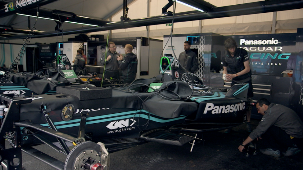 Engineers at work in the Panasonic Jaguar Racing garage