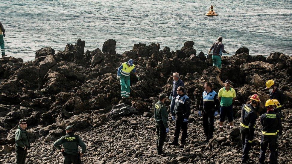 Spanish Civil Guard officials attend to dead migrants on Bastian de Costa Teguise beach, in Canary Islands, Spain on 15 January 2018.