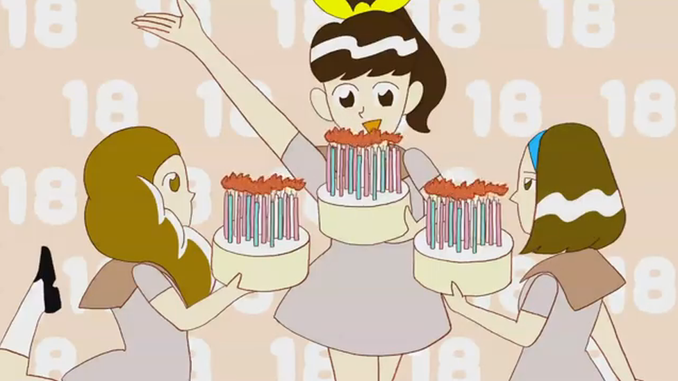 A still from the Nara city anime video shows three girls celebrating their 18th birthdays.