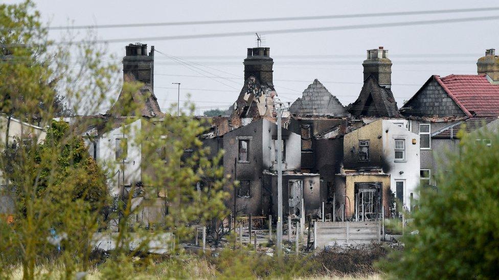 Burned out houses in Wennington