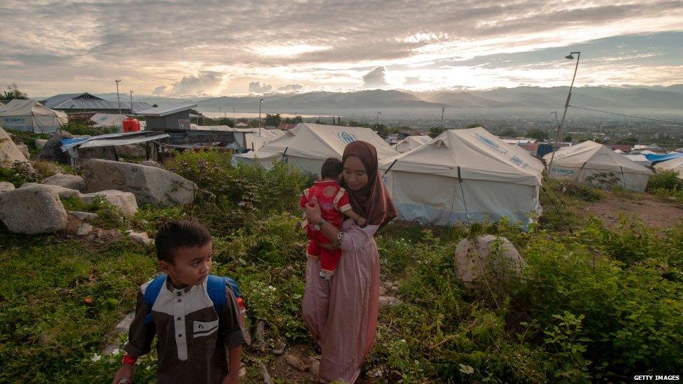 Migrant-family-in-a-refugee-camp-in-Indonesia.