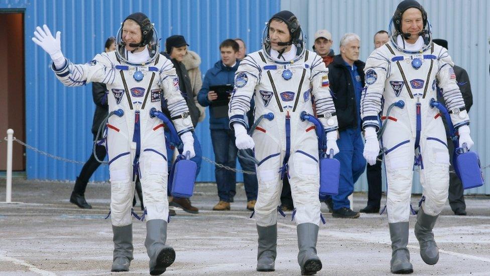 Tim Peake, Russian cosmonaut Yuri Malenchenko and US astronaut Tim Kopra prior the launch of Soyuz TMA-19M space ship at the Baikonur cosmodrome, Kazakhstan