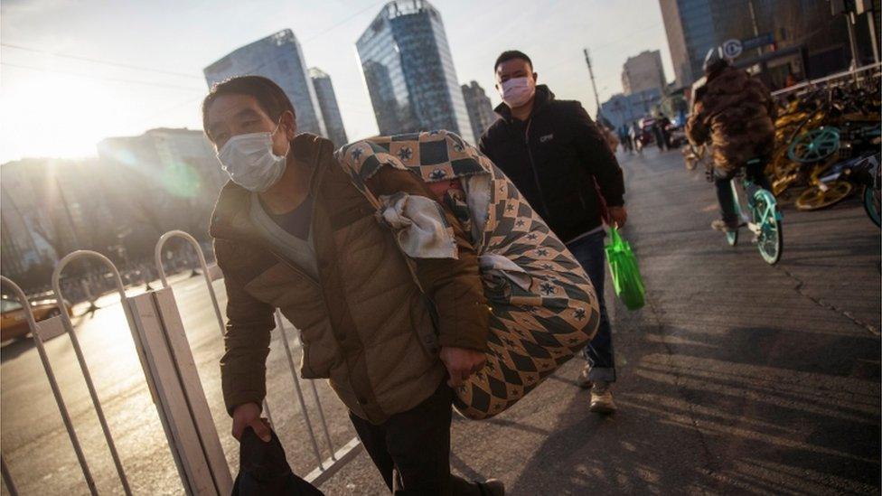 People with face masks in China