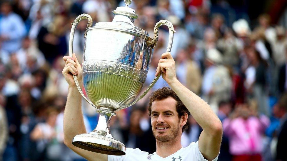 Murray holding the Queen's Club Championship trophy