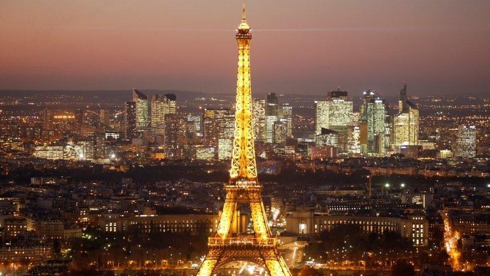 Eiffel Tower in foreground of La Defense