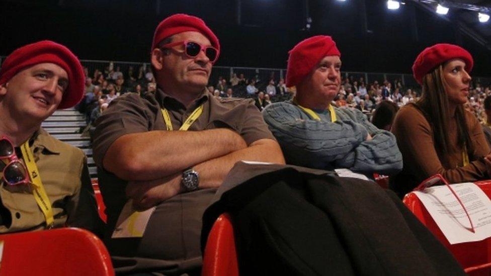 Delegates in red berets