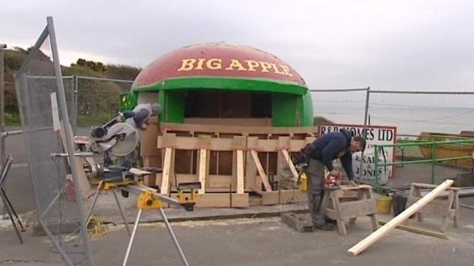 Repairing the Big Apple kiosk in Swansea in April 2010