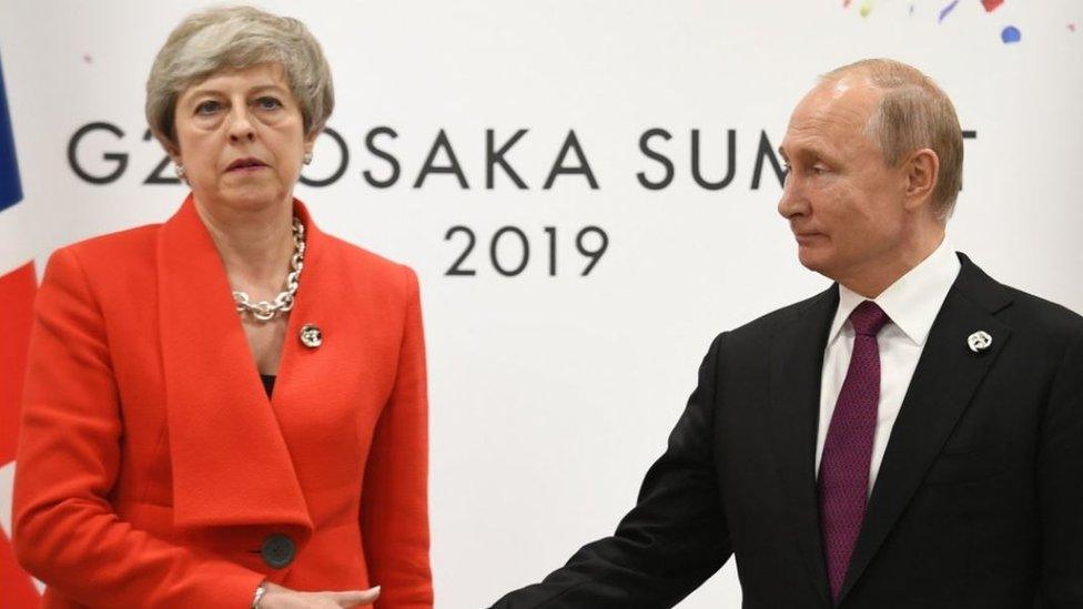 Former Prime Minister Theresa May frostily greeting Russia's President Putin.