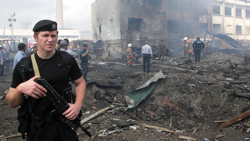 Policeman at site of attack on police compound in Ingushetia, 2010