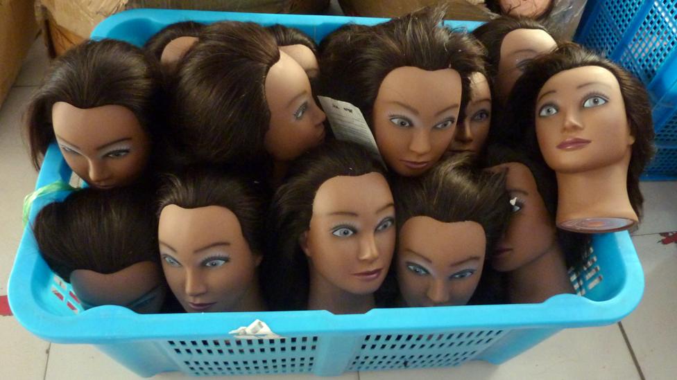 Human hair wigs at a factory in Xuchange, China