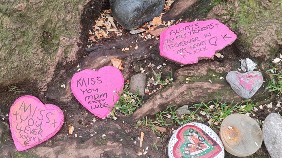 Memorial pebbles left at site