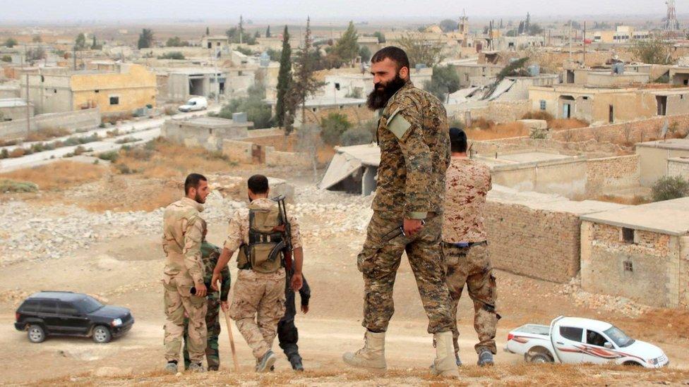 Syrian government forces in the village of Jabboul on the eastern outskirts of Aleppo (24 October 2015)