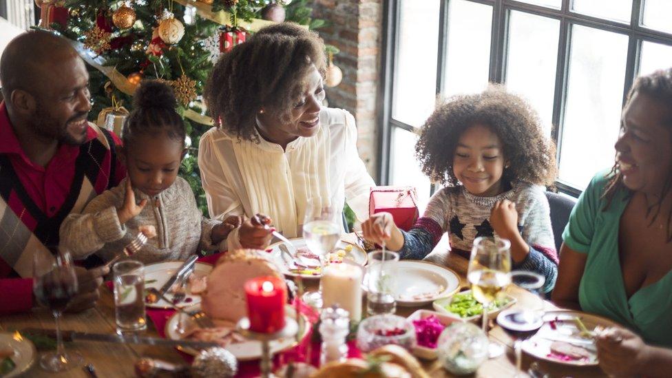 A family enjoying a festive celebration