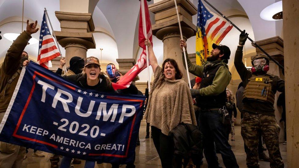 Supporters of US President Donald Trump protest inside the US Capitol on January 6, 2021