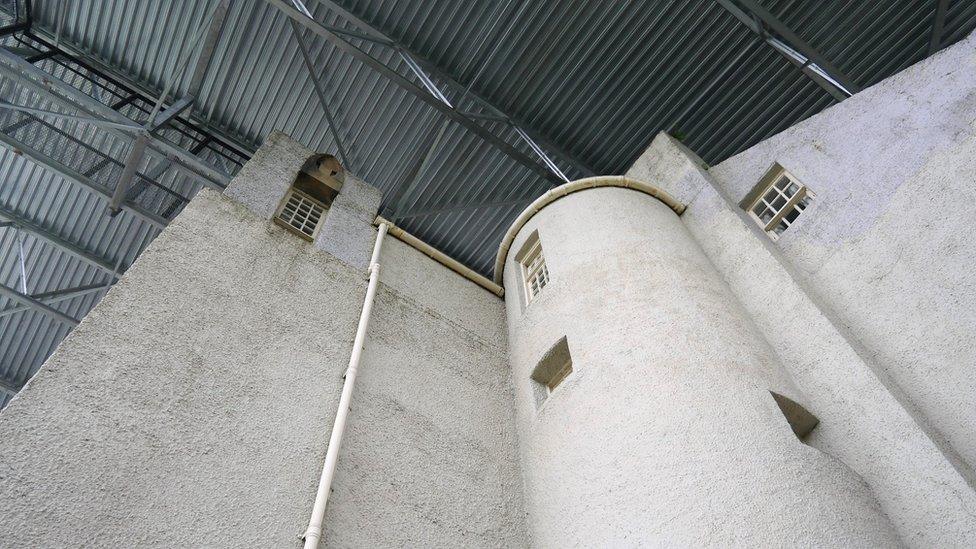 The roof is made of steel to protect the house from rain