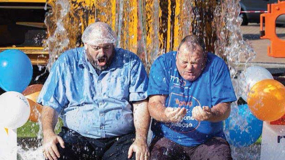 Volunteers completing the ice bucket challenge