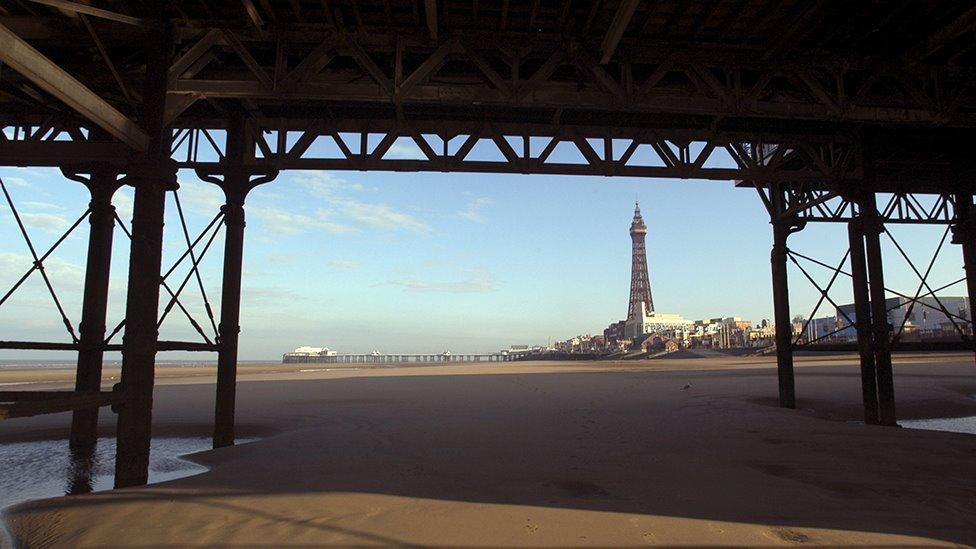 Blackpool Tower is seen from under the Central Pier