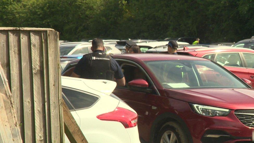 Police operating in car park