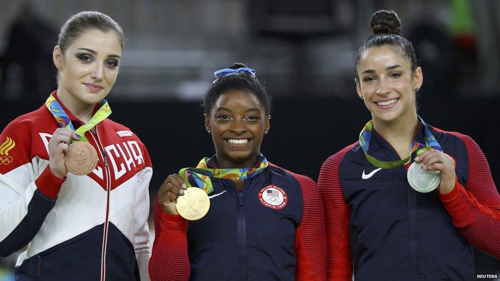 Simone Biles, Alexandra Raisman and Aliya Mustafina