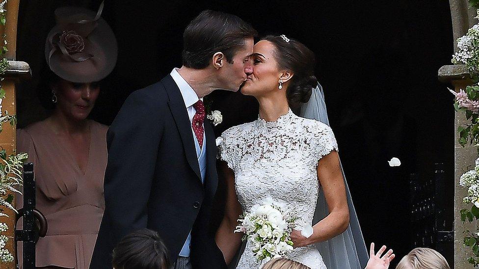 James Matthews and Pippa Middleton kiss after their marriage