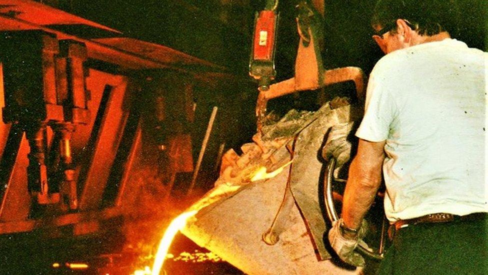 Worker inside the foundry