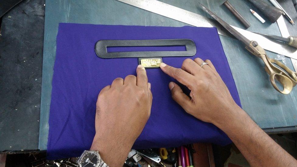 A Toteteca bag being manufactured