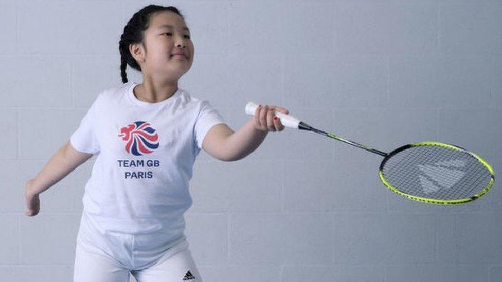 Alice with a badminton racket