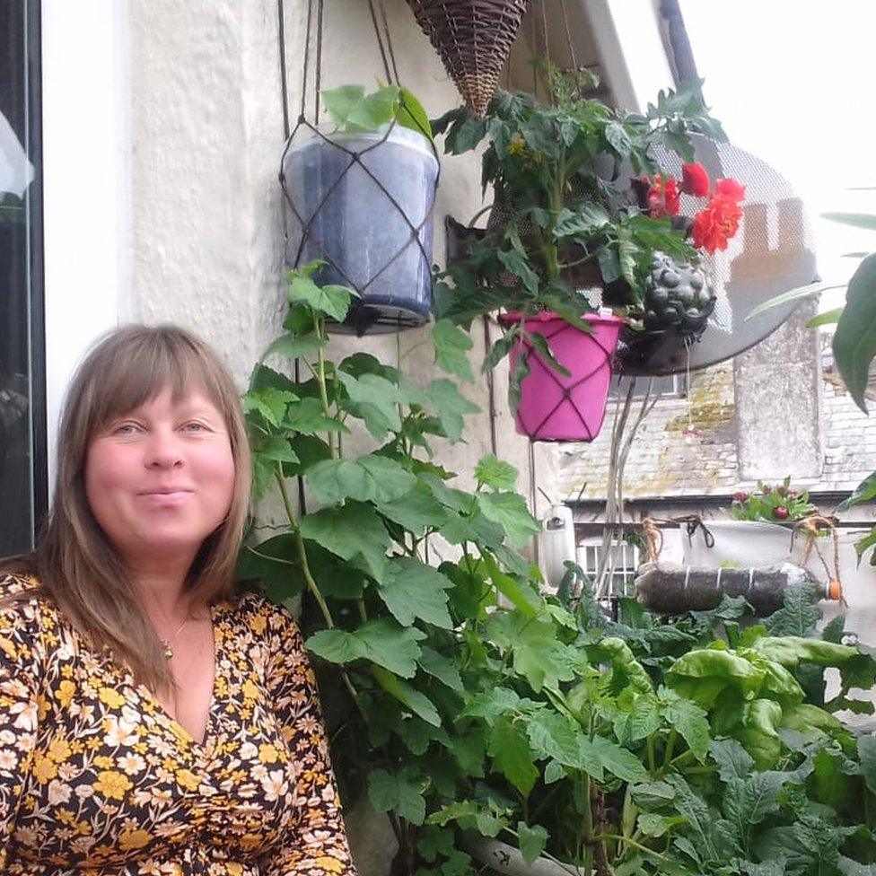 Hana on her balcony