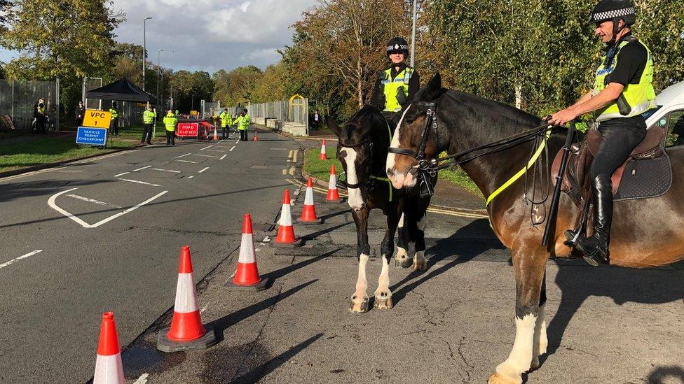 Police riders outside Bletchley Park