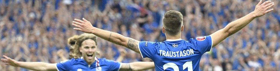 Arnor Ingvi Traustason (R) celebrates his winner against Austria in the dying moments of the game (22 June)