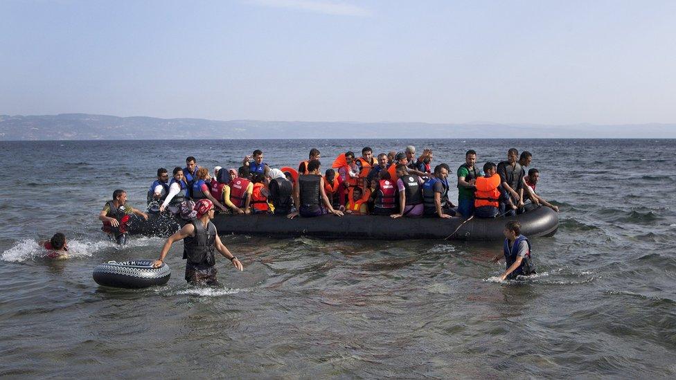 Syrian refugees arrive on a dinghy on the Greek island of Lesbos, September 7, 2015.