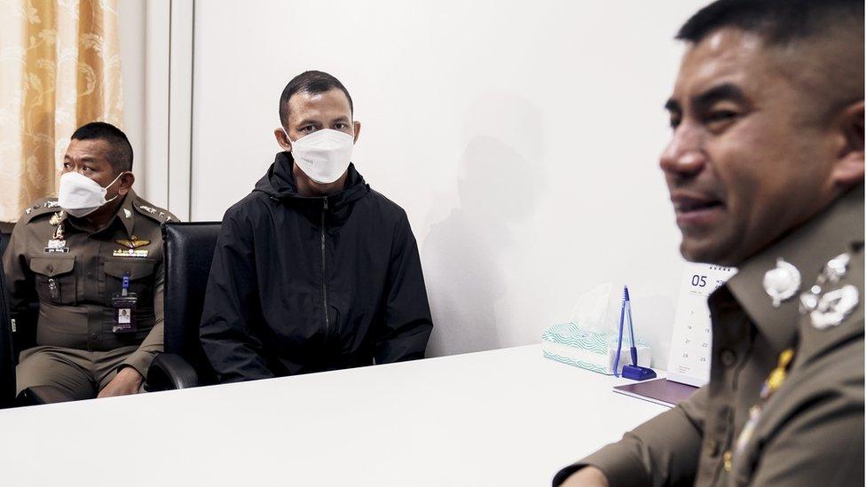 Lt Col Vithul Rangsiwutthaporn is questioned by police over a string of cyanide poison killings in Thailand