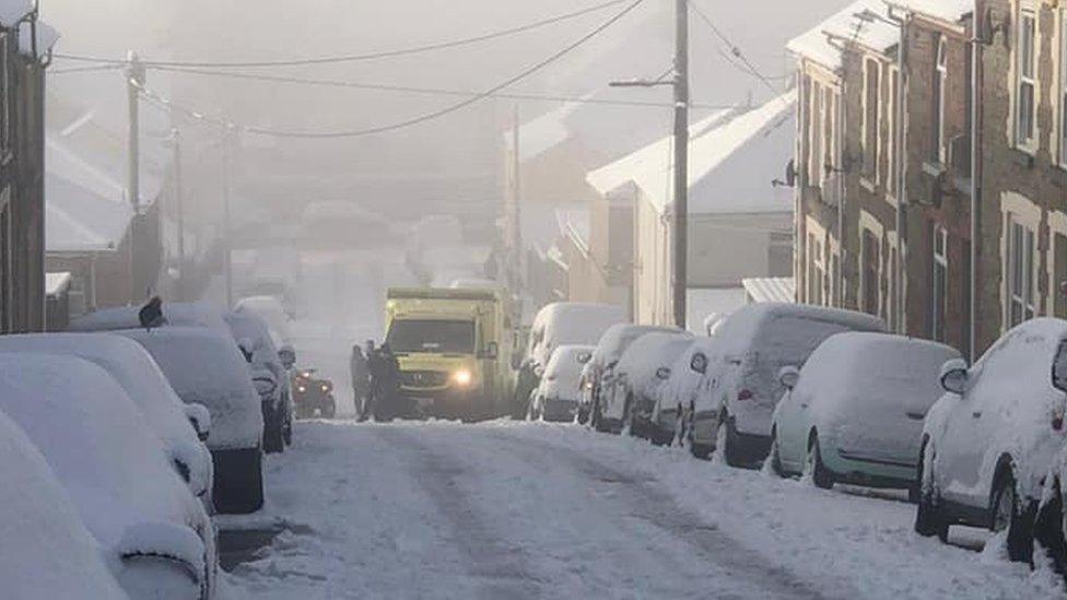 Ambulance stuck in snow