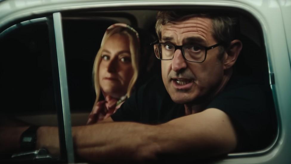 Louis Theroux and Amelia Dimoldenberg in the video for Jiggle Jiggle