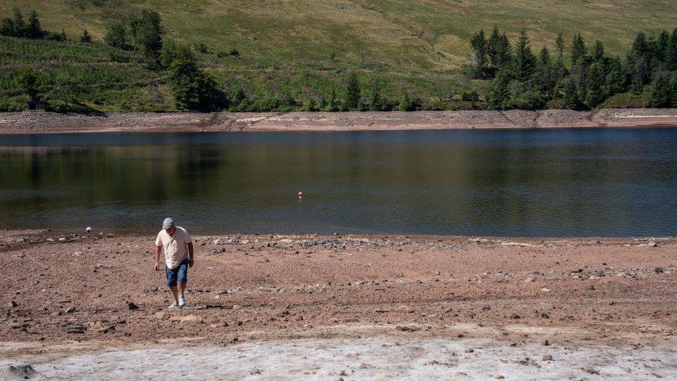 Low water levels on this reservoir on the edge of the Brecon Beacons