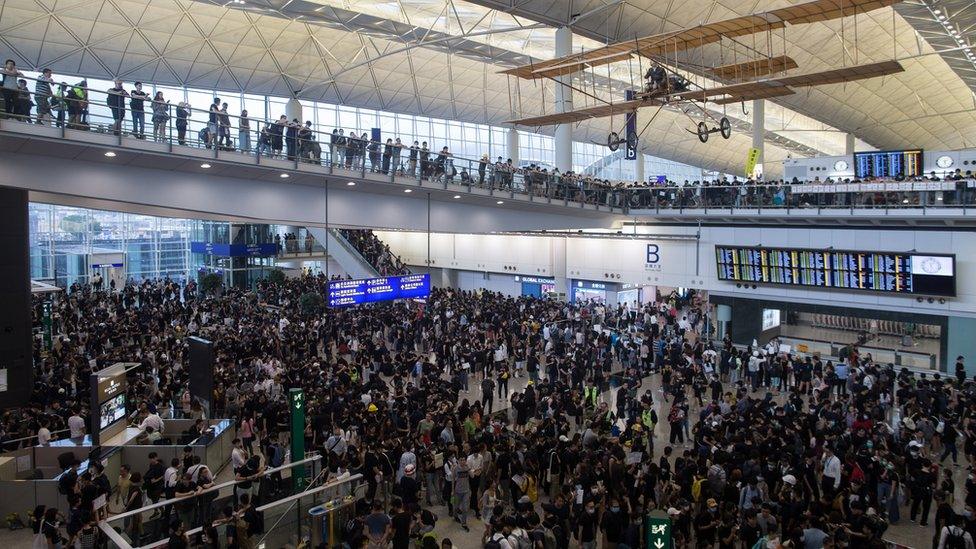 Protesters occupy Hong Kong Chek Lap Kok International Airport in Hong Kong, China,