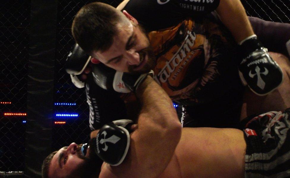 Granieri fights opponent in the ring