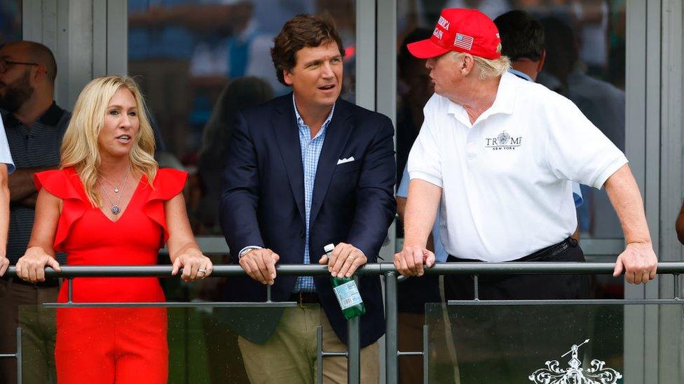 Former President Donald Trump, Tucker Carlson and Marjorie Taylor Greene during the 3rd round of the LIV Golf Invitational Series Bedminster on July 31, 2022 at Trump National Golf Club in Bedminster, New Jersey