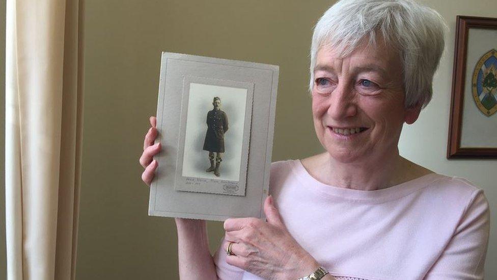 Margaret Barr holding photo of David Wyllie