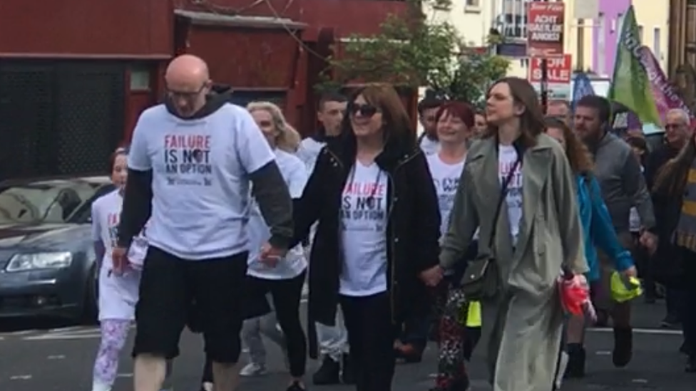 Lyra's Walk participants enter Derry city centre