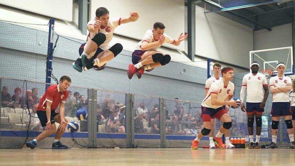 Players from the England Lions dodging a ball