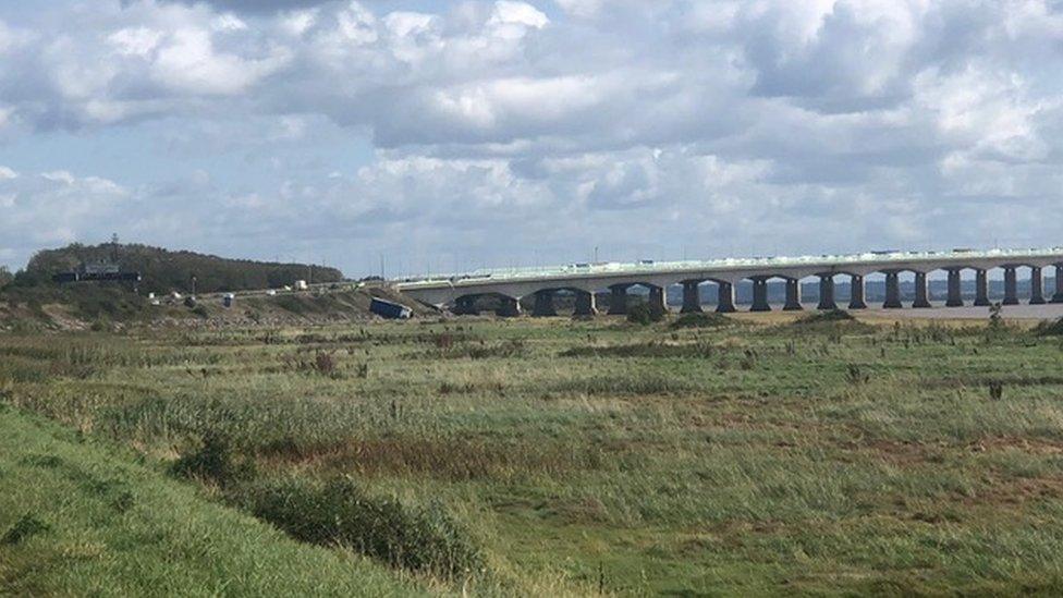 A lorry has crashed off the M4 motorway just inside Wales.