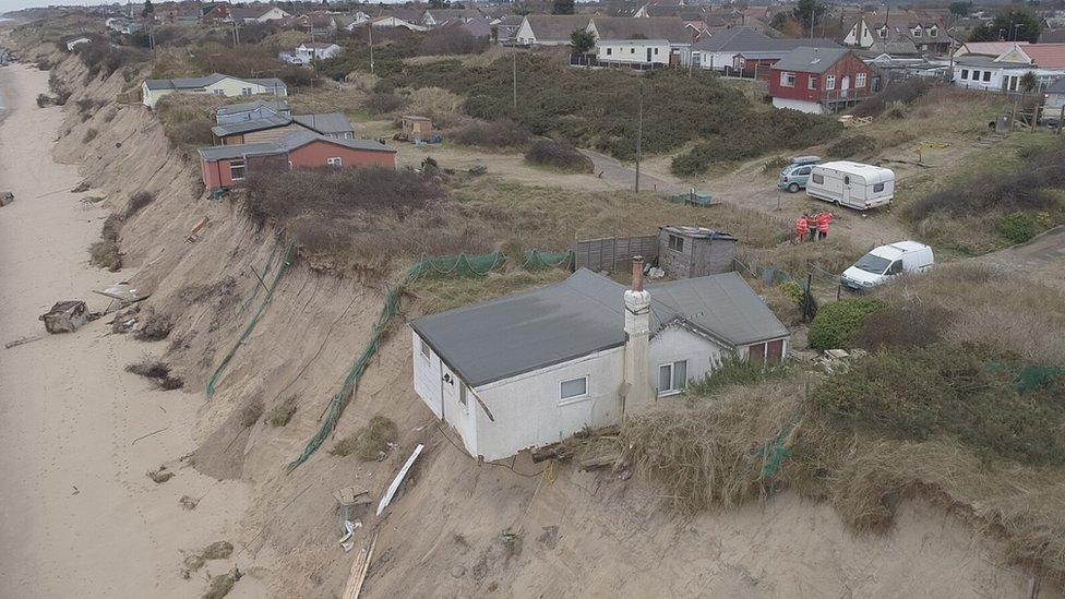 Hemsby chalet over-hanging cliff