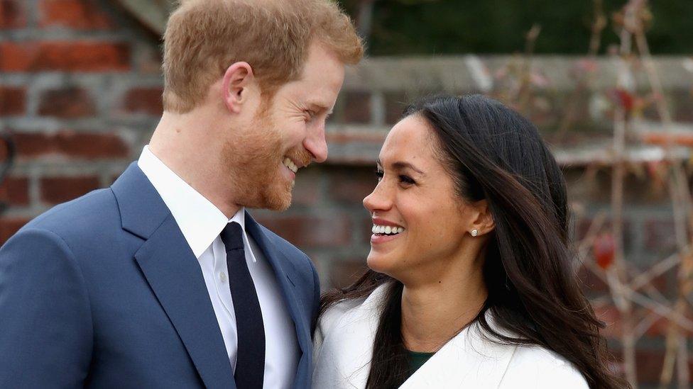 Prince Harry and Meghan Markle during an official photocall to announce their engagement