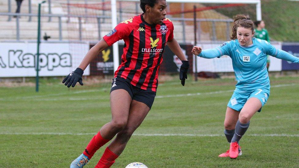 Ini Umotong in action for Lewes FC