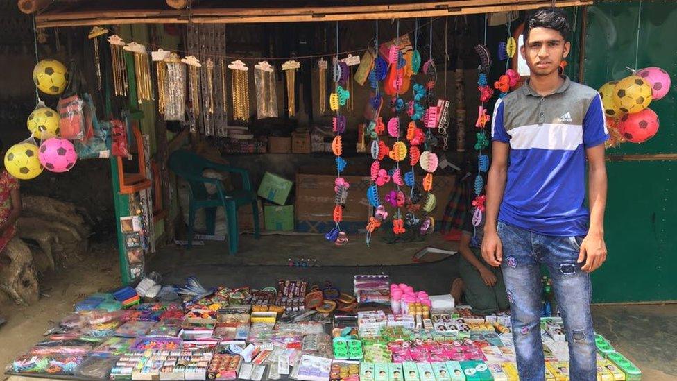 Faisal outside his shop in the Kutaupalong area of the camp